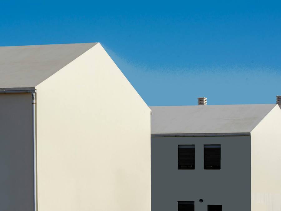 A home using soft grey render tones — the most popular family for UK houses