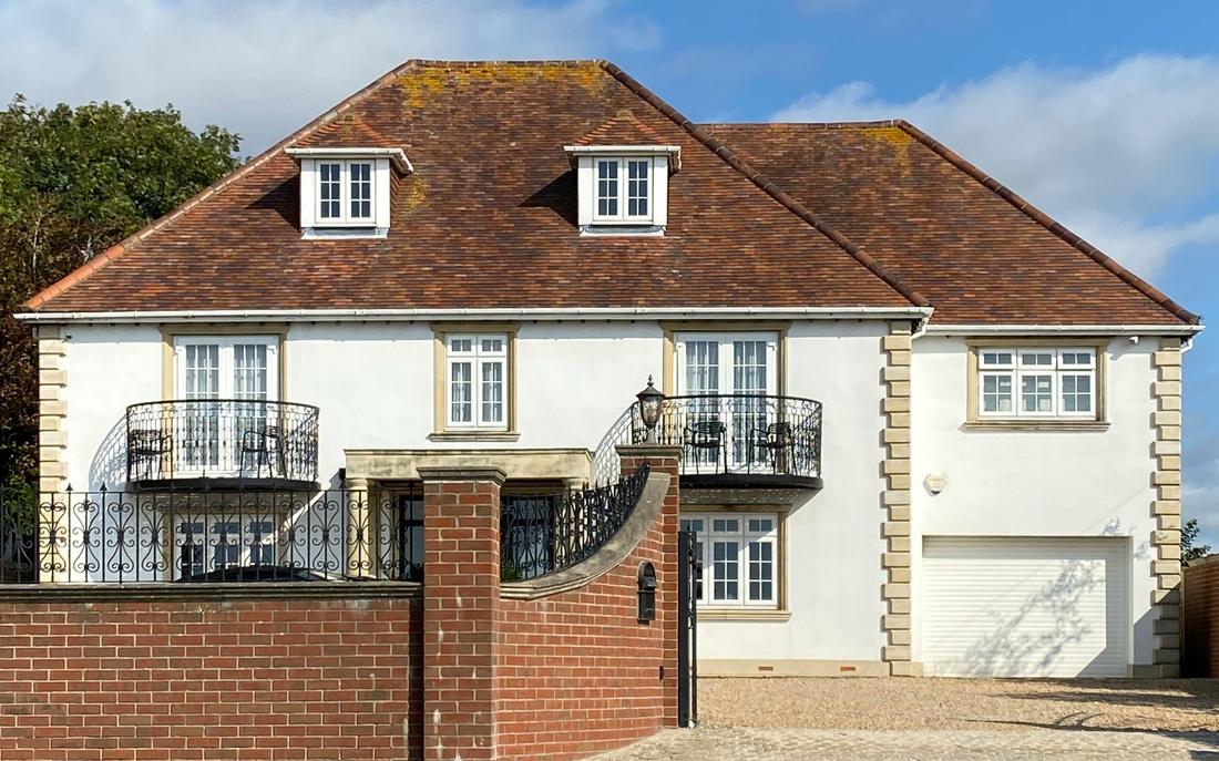 Rendered home near Ealing — example finish