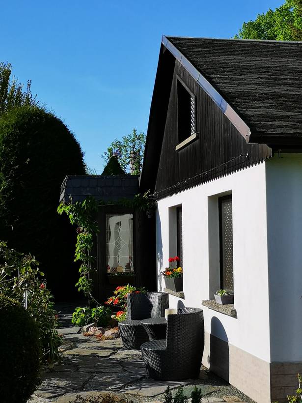 Rendered home near Ealing — example finish